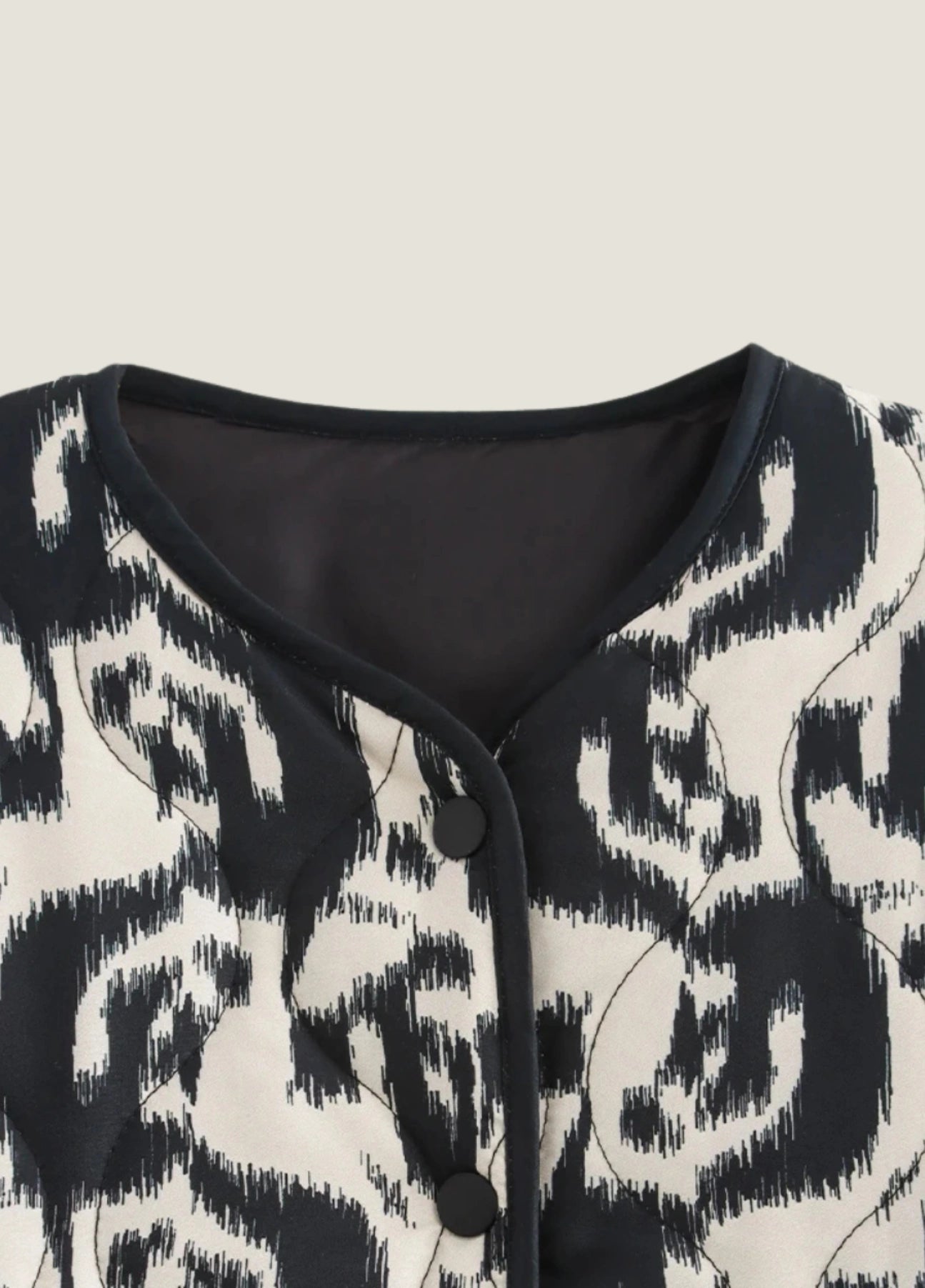 White & black quilted jacket